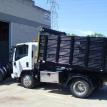 10' Isuzu Dumping Stake Body, W/ Plow and Solid Racks